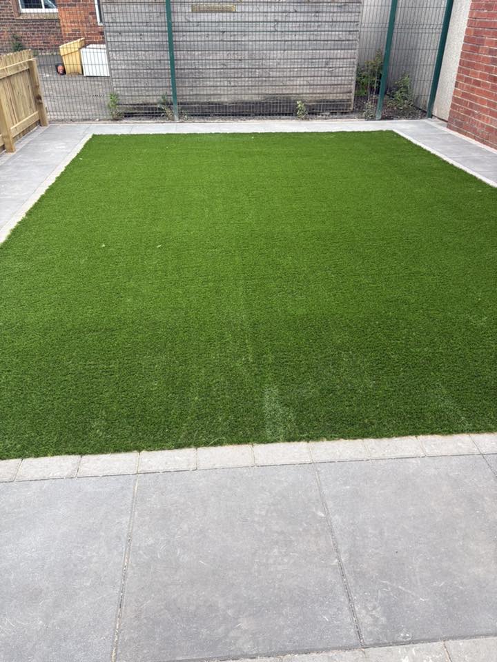 Artificial grass and paving — completed garden project